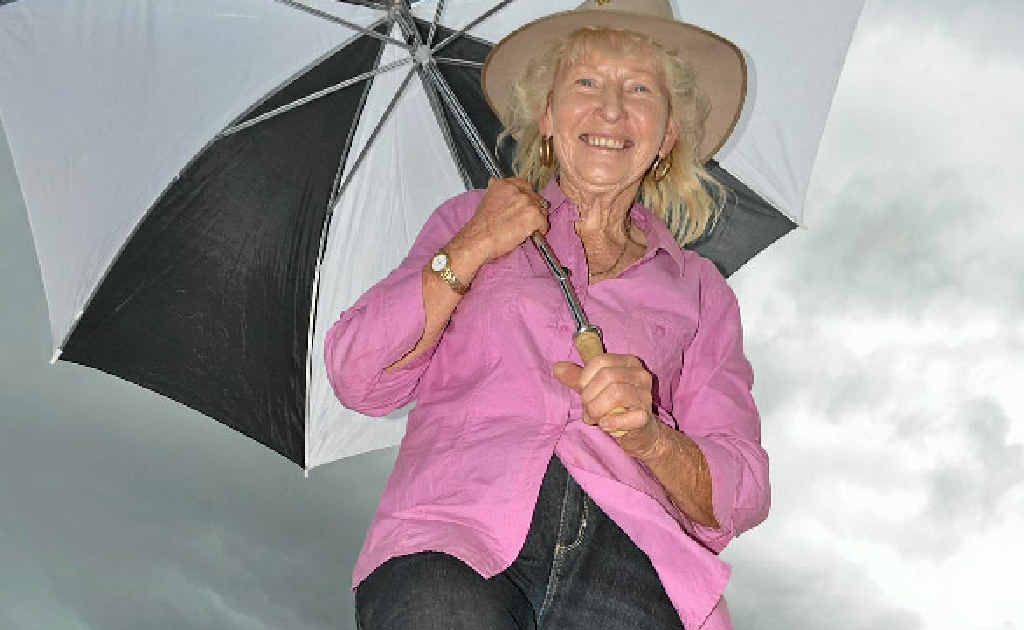 Ann Edmonds makes sure she stays dry before the heavens opened yesterday afternoon. Ann Edmonds makes sure she stays dry before the heavens opened yesterday afternoon.